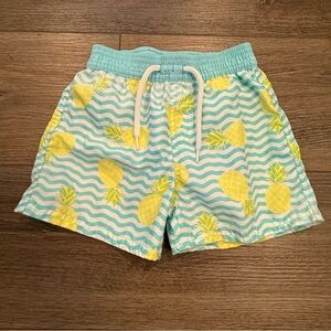 Floatimini Turquoise Wave Swim Trunks with Yellow Pineapple Print